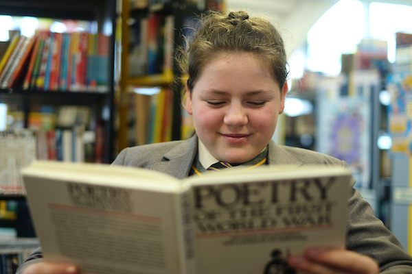 Girl reading poetry book